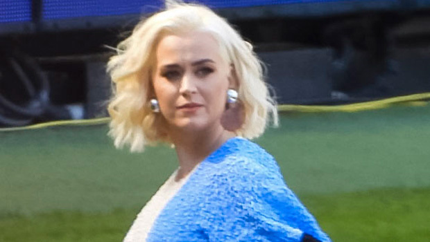 Katy Perry Shows Off Growing Baby BumpIn Tight Dress Ahead Of PerformanceIn Australia